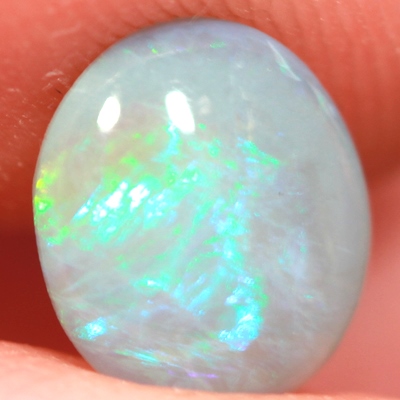 SOLID BLACK CRYSTAL OPAL Rolling flashes of green and turquoise